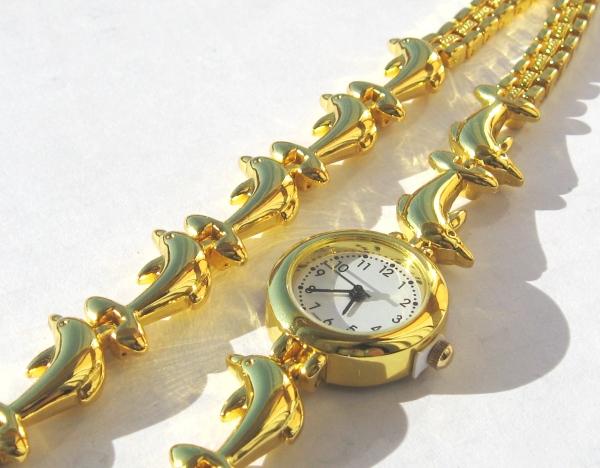 Gold plated Dolphin watch from crimeajewel